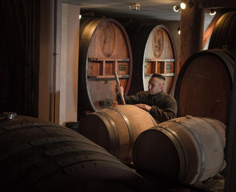 Charlier et Fils Champagne production - champagne fermenting in oak barrels