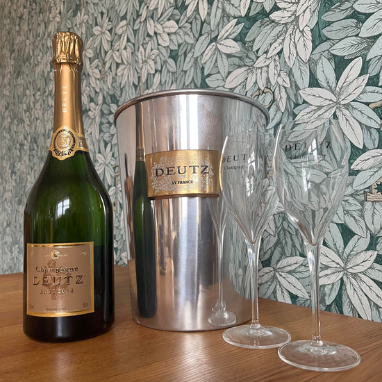 Deutz champagne with champagne bucket and matching glasses
